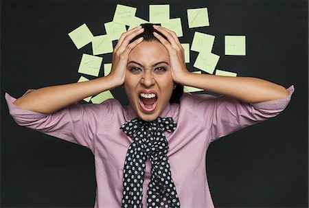simsearch:6108-06167824,k - Businesswoman shouting in front of a bulletin board Stock Photo - Premium Royalty-Free, Code: 630-06722073