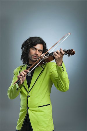Man playing a violin Stock Photo - Premium Royalty-Free, Code: 630-06722277