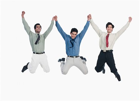 raised hand (not student) - Three businessmen jumping Stock Photo - Premium Royalty-Free, Code: 630-06722394
