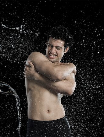 east indian (male) - Bare chested man splashed with water Stock Photo - Premium Royalty-Free, Code: 630-06722703