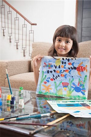 simsearch:6107-06117573,k - Portrait of a girl showing a painting Stock Photo - Premium Royalty-Free, Code: 630-06722976