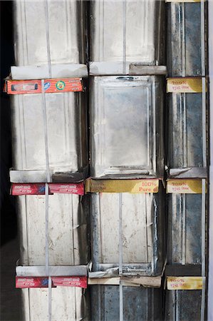 Close-up of oil containers in a warehouse, Sohna, Gurgaon, Haryana, India Stock Photo - Premium Royalty-Free, Code: 630-07071207