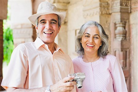 Portrait of a mature couple smiling, Lodi Gardens, New Delhi, India Stock Photo - Premium Royalty-Free, Code: 630-07071278