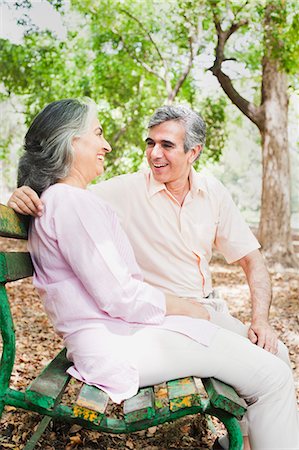 Mature couple smiling at each other in a park, Lodi Gardens, New Delhi, India Stock Photo - Premium Royalty-Free, Code: 630-07071308