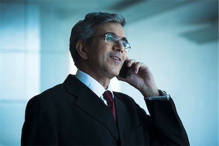simsearch:630-07071502,k - Businessman talking on a mobile phone Stock Photo - Premium Royalty-Free, Code: 630-07071526
