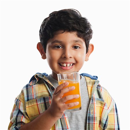 simsearch:630-07071771,k - Boy drinking juice Stock Photo - Premium Royalty-Free, Code: 630-07071768