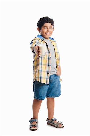 person standing cut out facing camera full length and one person - Boy holding a glass of milk Stock Photo - Premium Royalty-Free, Code: 630-07071771