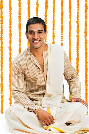 simsearch:700-00195618,k - South Indian man smiling at Onam Stock Photo - Premium Royalty-Free, Code: 630-07071879
