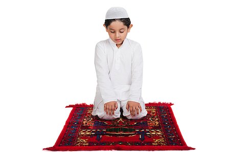 Muslim boy praying Foto de stock - Sin royalties Premium, Código: 630-07071922