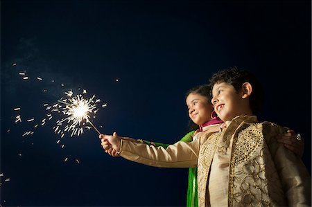 Children burning fire crackers on Diwali Stock Photo - Premium Royalty-Free, Code: 630-07071968