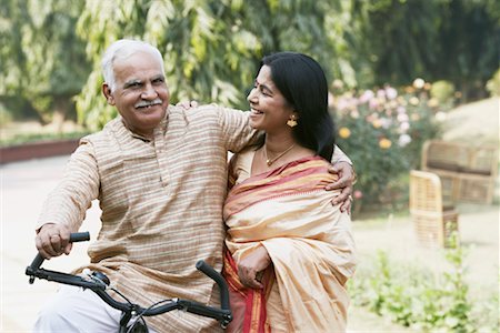 Close-up of a mature couple smiling Stock Photo - Premium Royalty-Free, Code: 630-01076443