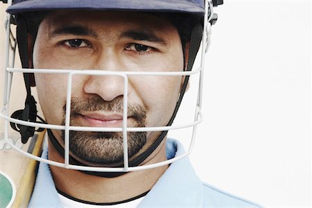 Portrait of a young man wearing a sports helmet Stock Photo - Premium Royalty-Free, Code: 630-01077127