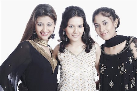 simsearch:700-00524621,k - Portrait of three young women smiling Stock Photo - Premium Royalty-Free, Code: 630-01077665