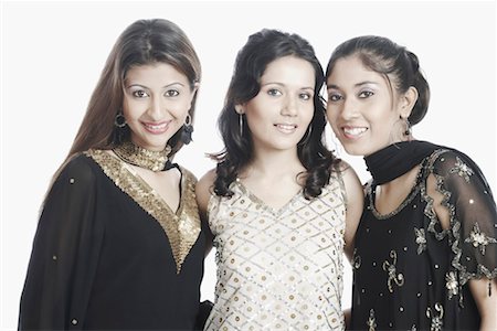 simsearch:700-00524621,k - Portrait of three young women smiling Stock Photo - Premium Royalty-Free, Code: 630-01077666
