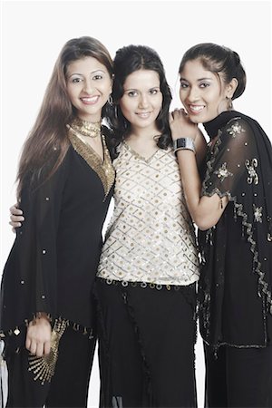 simsearch:700-00524621,k - Portrait of three young women smiling Stock Photo - Premium Royalty-Free, Code: 630-01077667