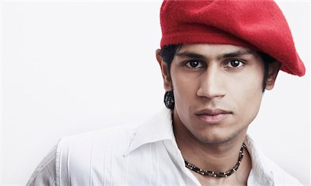 Portrait of a young man wearing a beret Stock Photo - Premium Royalty-Free, Code: 630-01079238