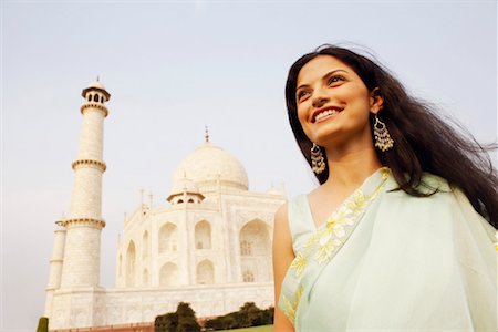 simsearch:857-03193051,k - Close-up of a young woman standing in front of a mausoleum, Taj Mahal, Agra, Uttar Pradesh, India Stock Photo - Premium Royalty-Free, Code: 630-01128468