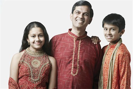 simsearch:630-01296751,k - Portrait of a mature man with his son and daughter Stock Photo - Premium Royalty-Free, Code: 630-01128724