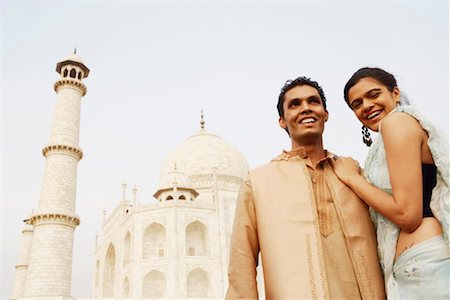 simsearch:857-03193051,k - Young couple standing in front of a mausoleum, Taj Mahal, Agra, Uttar Pradesh, India Stock Photo - Premium Royalty-Free, Code: 630-01128800