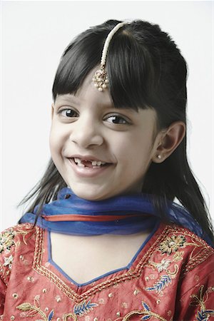simsearch:700-02047006,k - Portrait of a girl smiling Stock Photo - Premium Royalty-Free, Code: 630-01130162