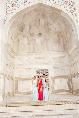 simsearch:700-01200131,k - Portrait of three young women standing in a mausoleum, Taj Mahal, Agra, Uttar Pradesh, India Stock Photo - Premium Royalty-Free, Code: 630-01131391