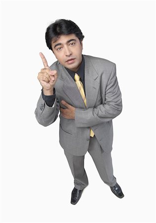 simsearch:640-01350815,k - High angle view of a businessman pointing up Stock Photo - Premium Royalty-Free, Code: 630-01191691