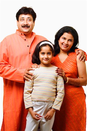 simsearch:630-01296751,k - Portrait of a girl with her parents smiling Stock Photo - Premium Royalty-Free, Code: 630-01297005