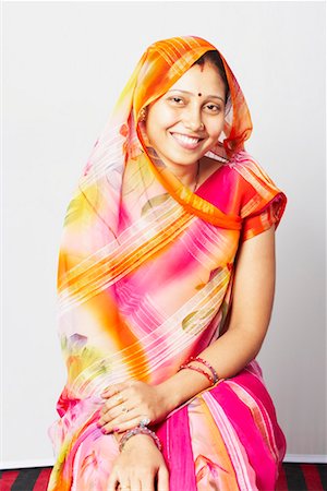 rajasthan clothes for women - Portrait of a young woman wearing a sari Stock Photo - Premium Royalty-Free, Code: 630-01490638