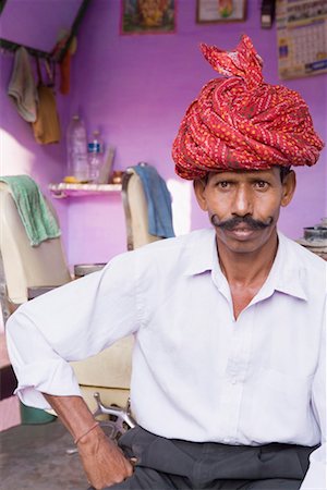 Mature man sitting in a barber shop Stock Photo - Premium Royalty-Free, Code: 630-01490674