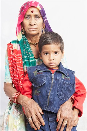 rajasthan clothes for women - Portrait of a boy standing with his grandmother Stock Photo - Premium Royalty-Free, Code: 630-01490742