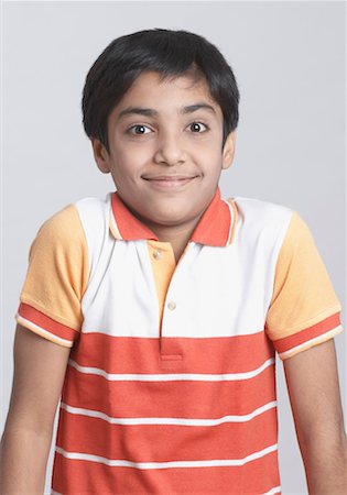 simsearch:630-01491544,k - Portrait of a boy smirking Stock Photo - Premium Royalty-Free, Code: 630-01491539