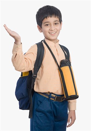 signs on school - Portrait of a schoolboy waving his hand Stock Photo - Premium Royalty-Free, Code: 630-01491717