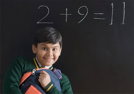 simsearch:630-01491544,k - Portrait of a schoolboy holding his schoolbag Stock Photo - Premium Royalty-Free, Code: 630-01491785