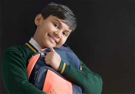 simsearch:630-01491544,k - Portrait of a schoolboy holding his schoolbag Stock Photo - Premium Royalty-Free, Code: 630-01491786