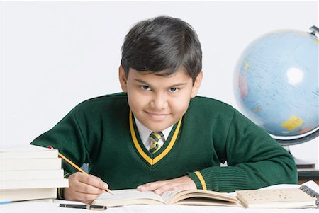 simsearch:630-01491544,k - Portrait of a schoolboy smiling Stock Photo - Premium Royalty-Free, Code: 630-01491782