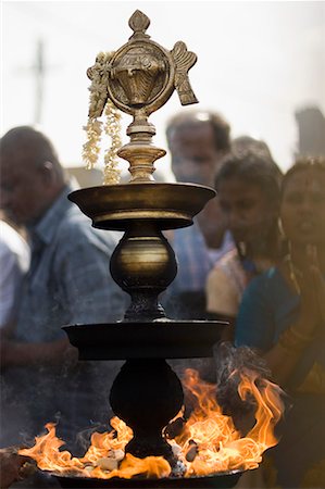 simsearch:400-06071678,k - Close-up of a burning oil lamp, Tirupati, Tirumala Venkateswara Temple, Tirumala, Andhra Pradesh, India Stock Photo - Premium Royalty-Free, Code: 630-01707705