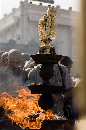 simsearch:400-06071678,k - Close-up of a burning oil lamp, Tirupati, Tirumala Venkateswara Temple, Tirumala, Andhra Pradesh, India Stock Photo - Premium Royalty-Free, Code: 630-01707707