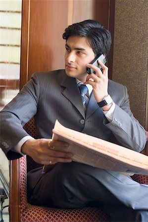 simsearch:630-01873072,k - Businessman talking on a mobile phone Stock Photo - Premium Royalty-Free, Code: 630-01708453