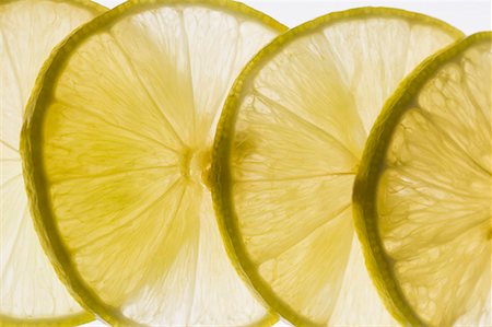 Close-up of lemon slices Foto de stock - Sin royalties Premium, Código: 630-01709299