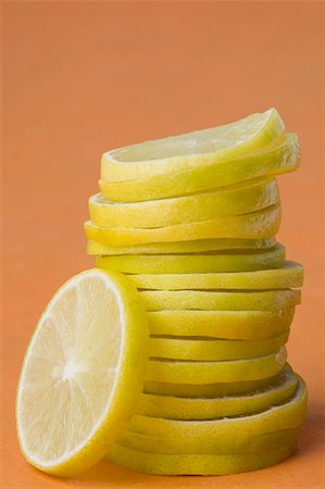 Close-up of a stack of lemon slices Foto de stock - Sin royalties Premium, Código: 630-01709304
