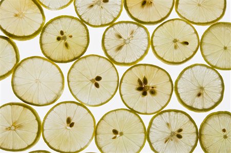 Close-up of lemon slices Foto de stock - Sin royalties Premium, Código: 630-01709300