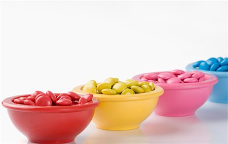 simsearch:630-01709492,k - Row of four bowls filled with candies Stock Photo - Premium Royalty-Free, Code: 630-01709456