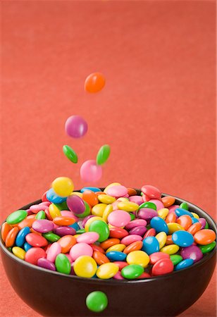 simsearch:630-01709492,k - Candies falling into a bowl Stock Photo - Premium Royalty-Free, Code: 630-01709466
