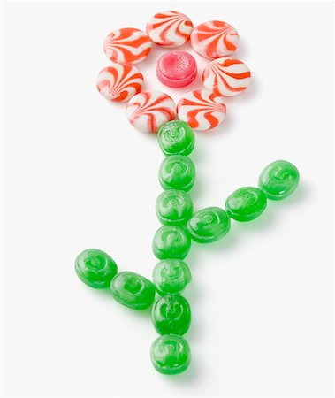 simsearch:630-01709492,k - High angle view of multi-colored candies arranged in the form of a flower Stock Photo - Premium Royalty-Free, Code: 630-01709506