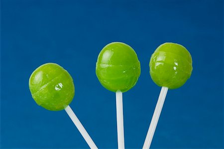 simsearch:630-01709492,k - Close-up of three green lollipops Stock Photo - Premium Royalty-Free, Code: 630-01709502