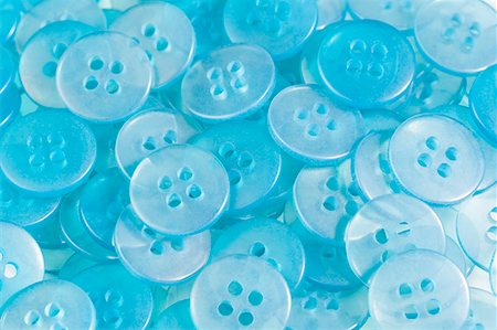 Close-up of sky blue buttons Stock Photo - Premium Royalty-Free, Code: 630-01709621