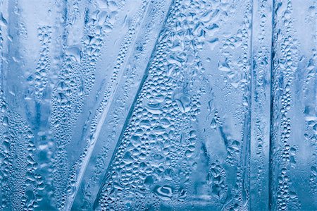 Close-up of water droplets on a bottle surface Foto de stock - Sin royalties Premium, Código: 630-01709761