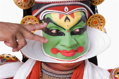 Gros plan d'une gestuelle d'interprète danse Kathakali Photographie de stock - Premium Libres de Droits, Code: 630-01709937