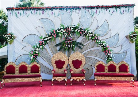 Two armchairs with couches on a wedding stage Stock Photo - Premium Royalty-Free, Code: 630-01875021