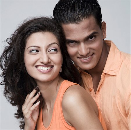 simsearch:630-01296756,k - Close-up of a young couple smiling Foto de stock - Sin royalties Premium, Código: 630-01875361